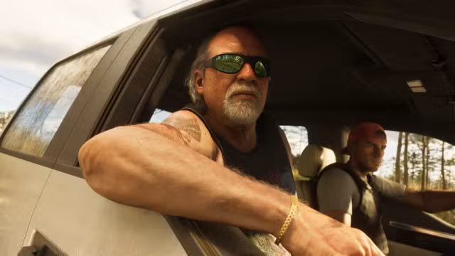 GTA VI screenshot with Brian and Jason sat in a car, Brian is looking out of the window wearing sunglasses