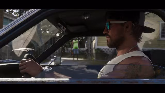 GTA VI Trailer 2 screenshot showing Jason within a car he is driving